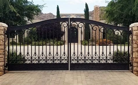 house with high black metal gates|metal gates designs.